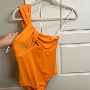 Princess Polly one shoulder orange body suit